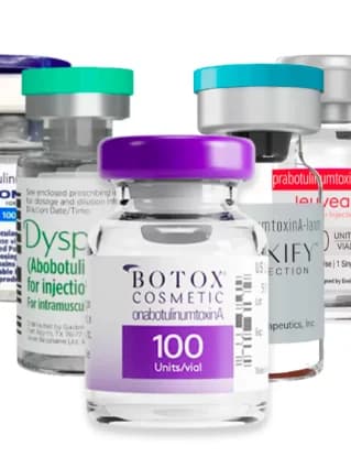 Vials of Botox® Cosmetic, Dysport®, DAXXIFY® and Jeuveau® grouped together against a white background